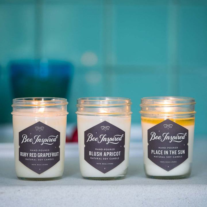 Summer Candle Set burning against blue background 