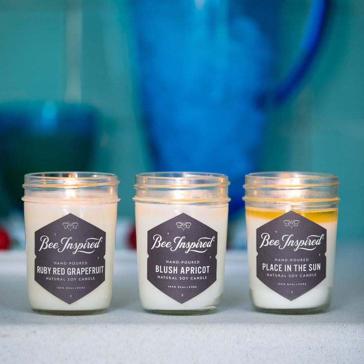 Summer Candle Set burning against blue background 
