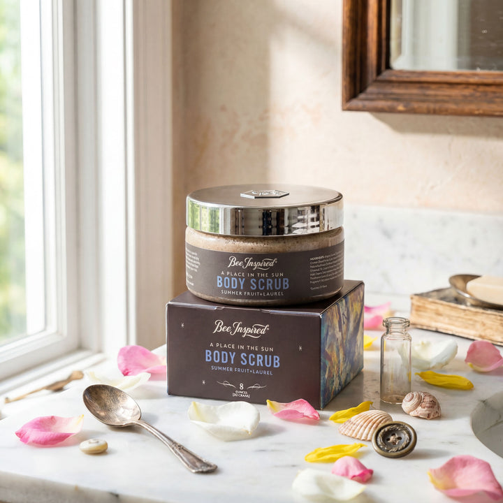 Body scrub jar and packaging on a marble surface with decorative elements