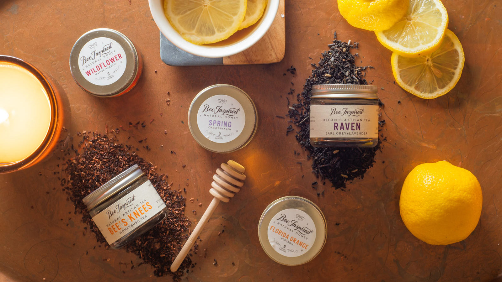 broken down tea for two tower lifestyle image with lemons and a candle