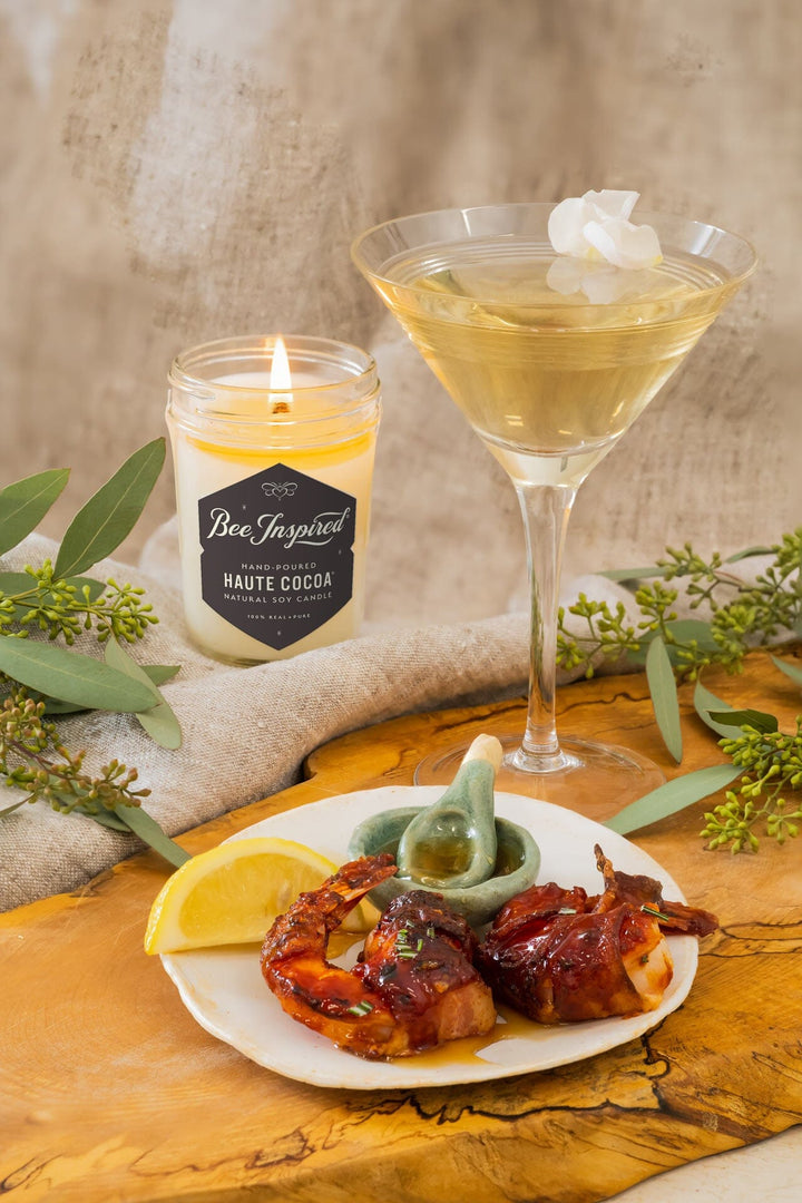 Haute Cocoa Soy Jelly Jar Candle wiht martini and bacon wrapped shrimp