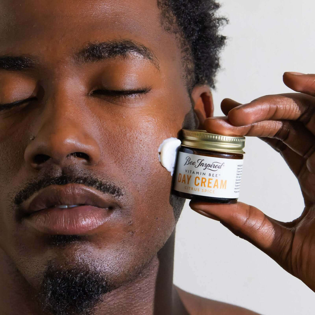man with Vitamin Bee citrus spice day cream on his face