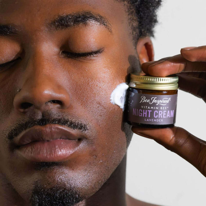 man with Vitamin Bee lavender night cream on his face