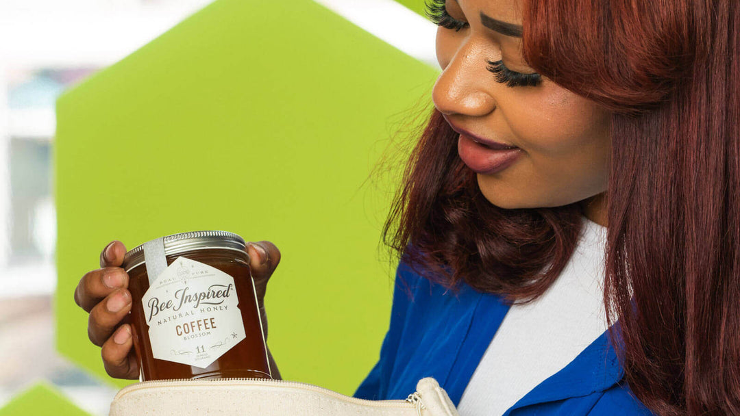 holding a jar of Coffee blossom honey from the Wake Up Call gift