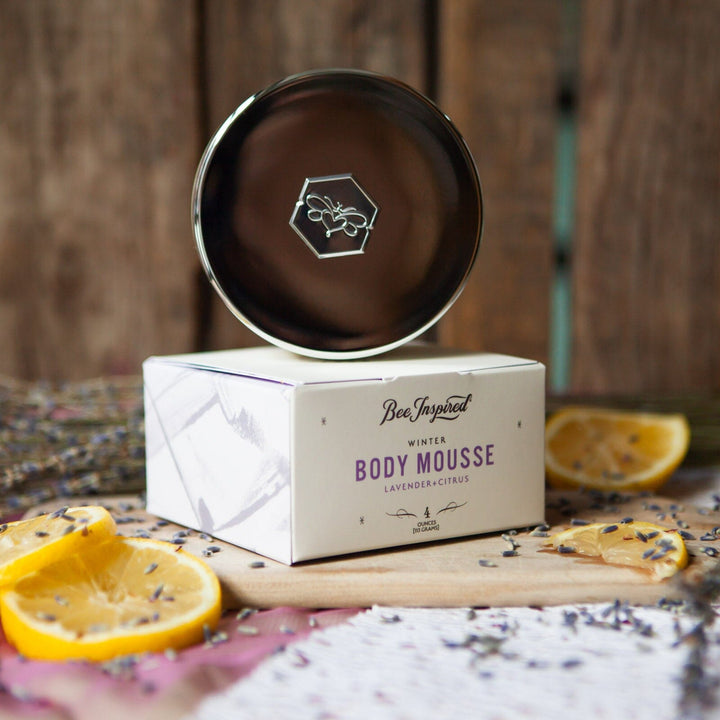 Winter Body Mouse in Lavender and Citrus on packaging on wood