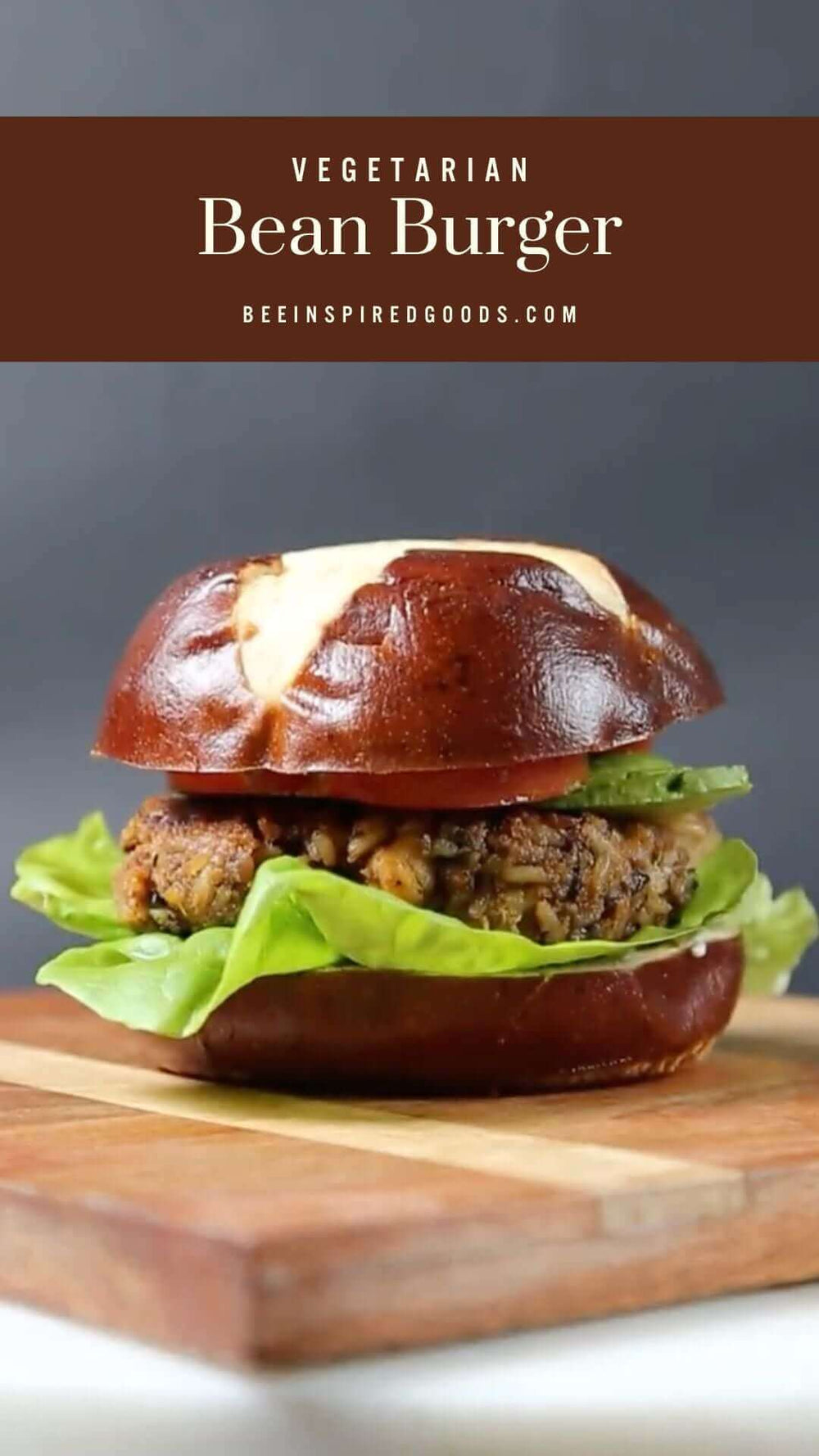 "Vegetarian Bean Burger beeinspiredgoods.com" with a bean burger on a wooden serving tray