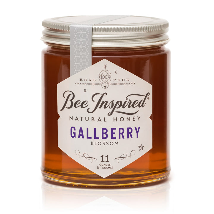 Jar of Bee Inspired Gallberry Blossom honey on a white background
