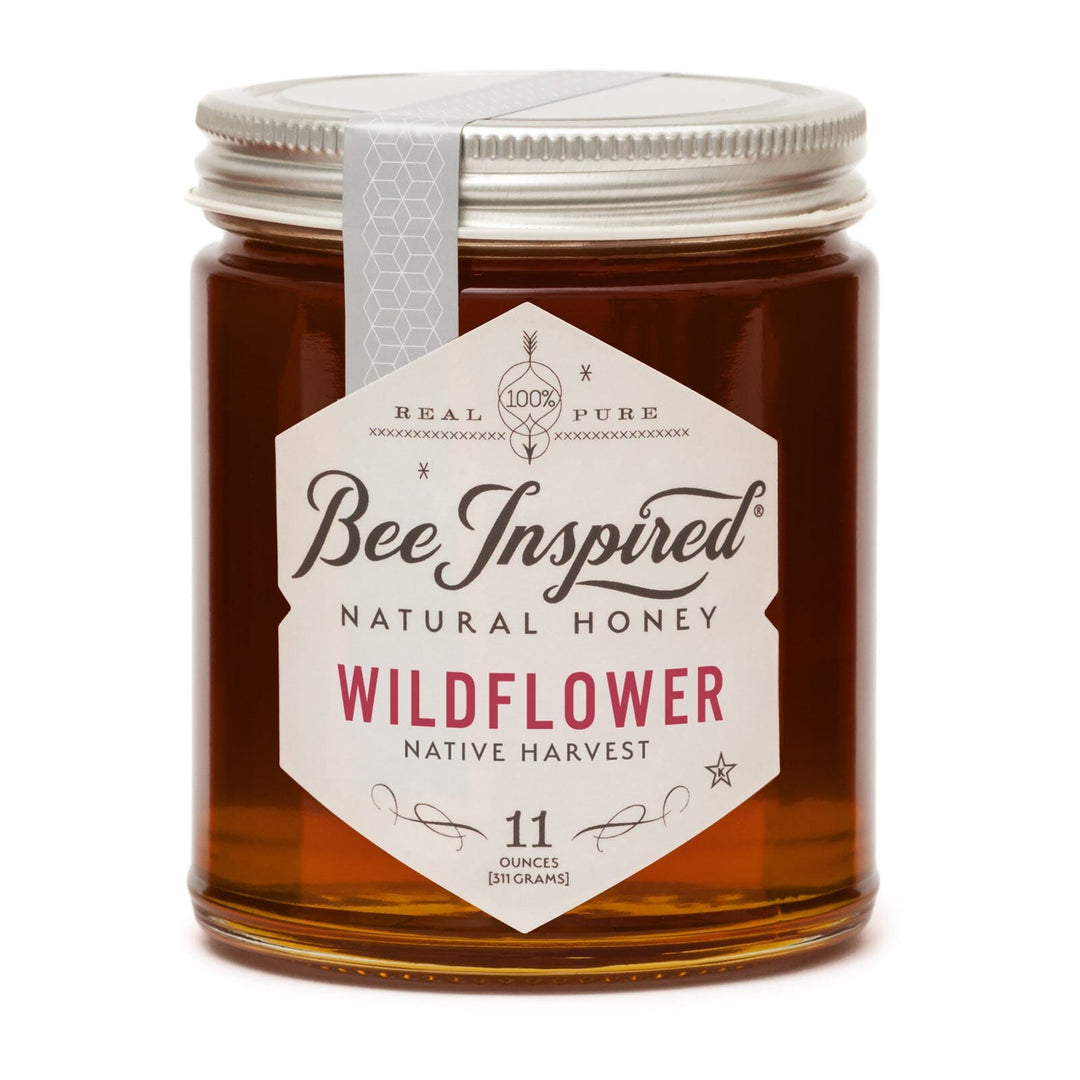 bee inspired wildflower honey on white
