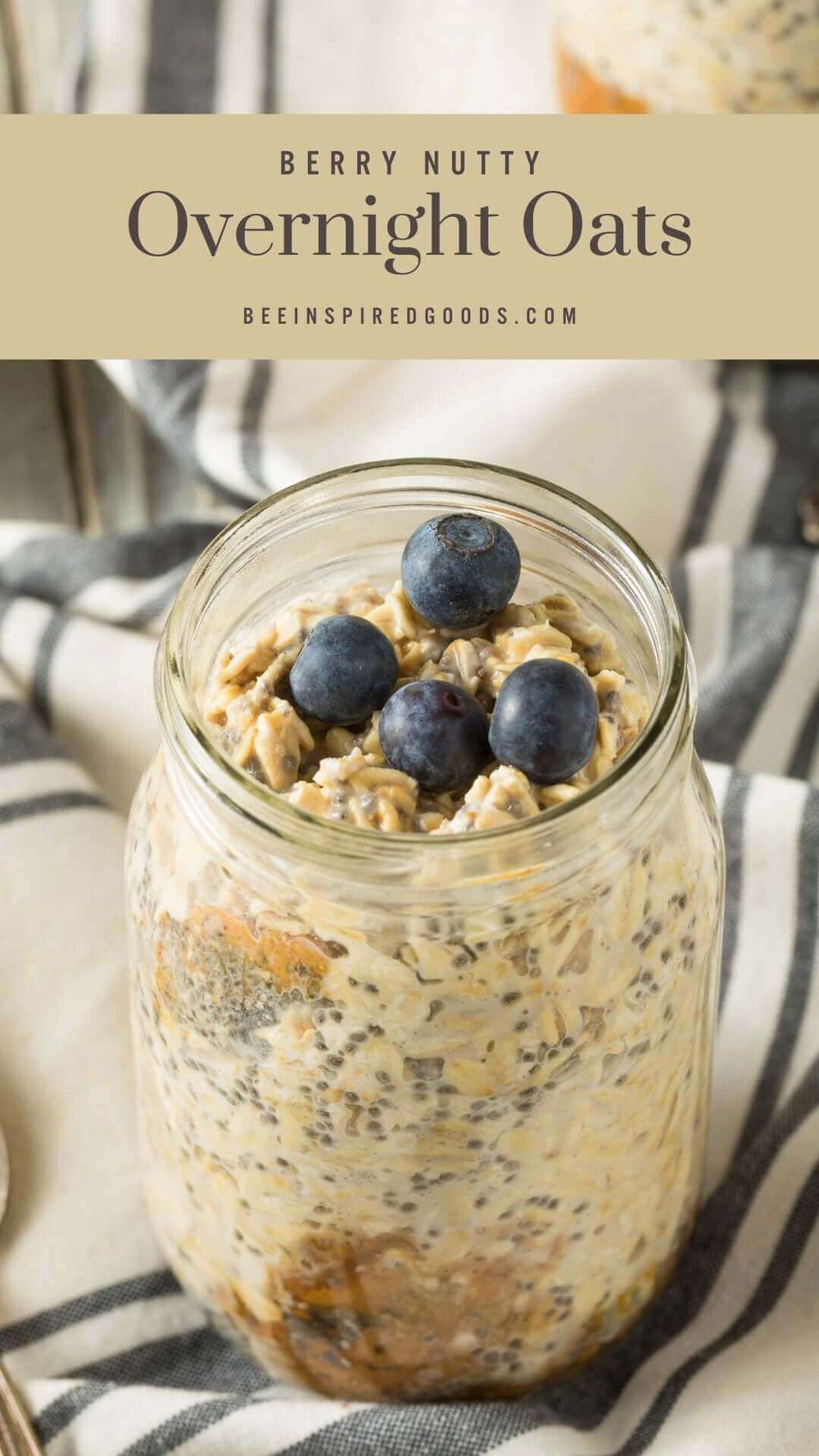 "berry nutty overnight oats beeinspiredgoods.com" overnight oats in a mason jar with blueberries on top
