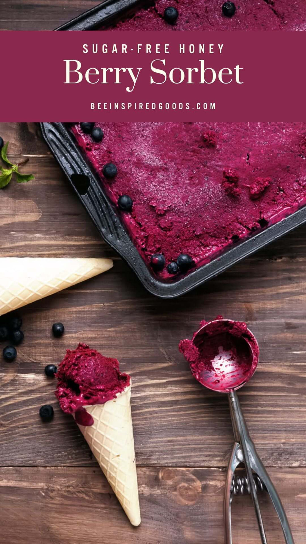 "Sugar-free honey Berry Sorbet beeinspiredgoods.com" an ice cream cone filled with purple berry sorbet next to an ice cream scooper