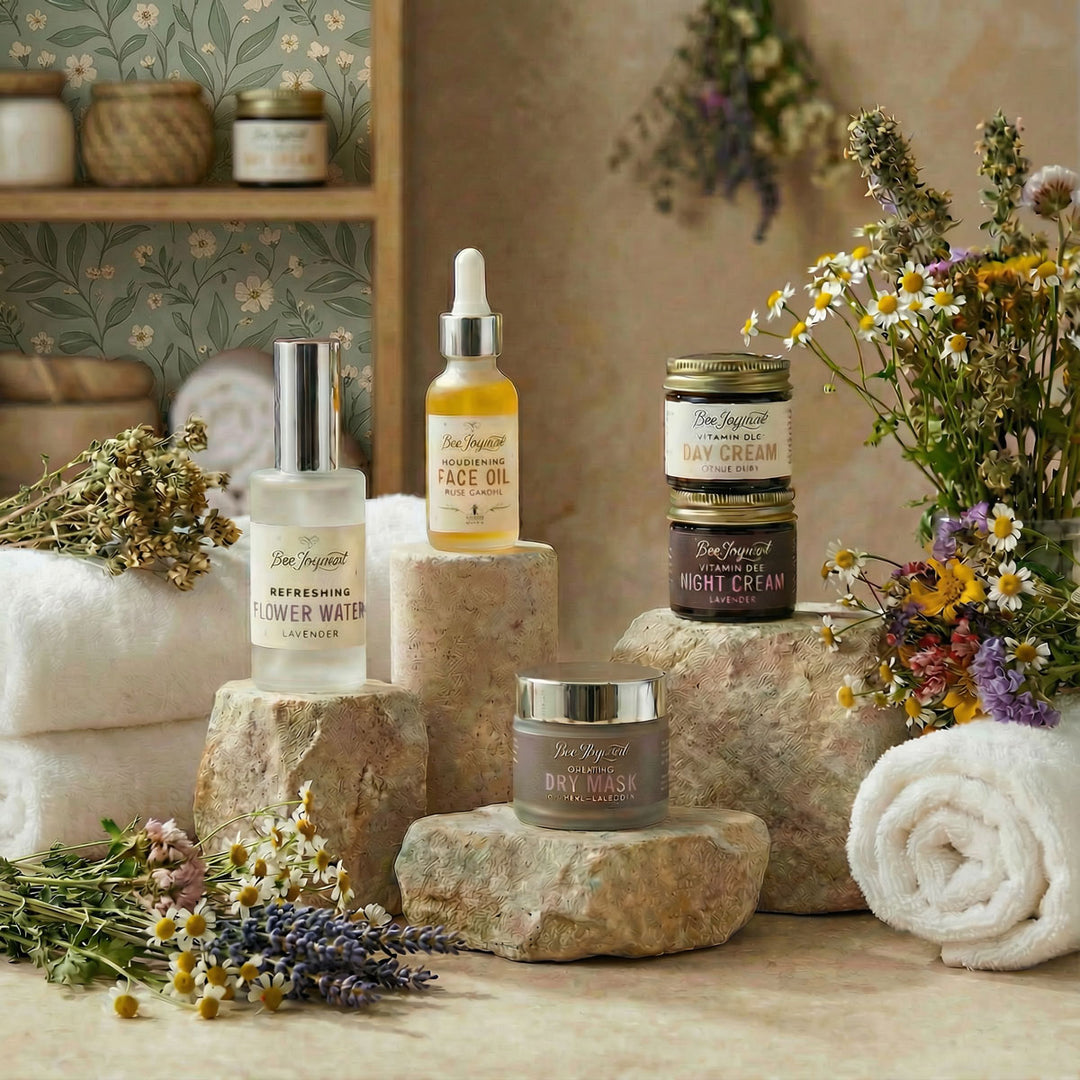 Best Face Forward Facecare set on stone blocks with flowers and towels in a natural setting