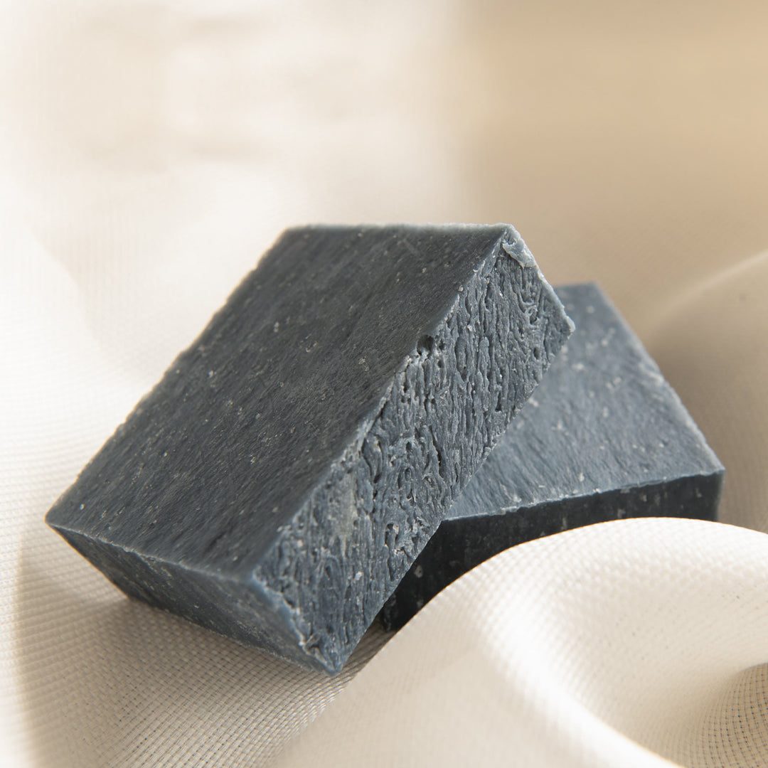 Sea Salt + Black Clay bar soaps on fabric 