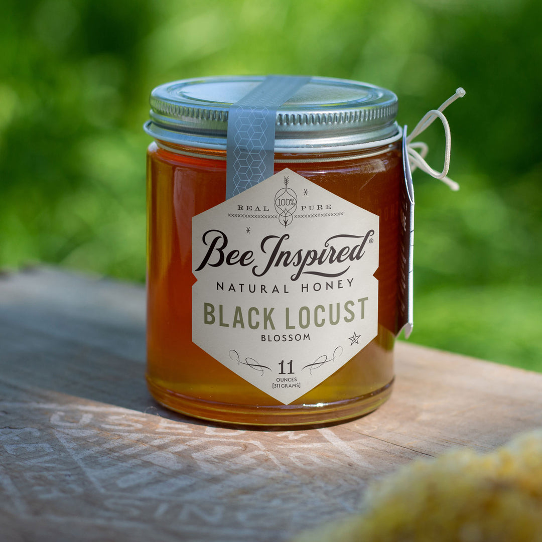 Black Locust honey on outdoor table 