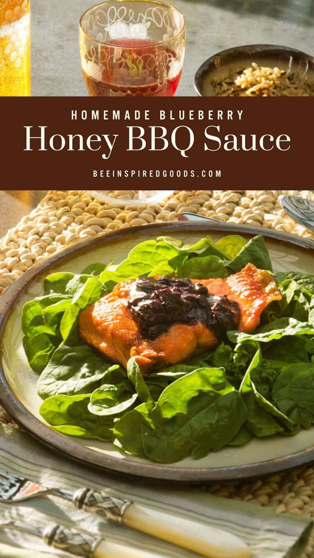 "homemade blueberry honey bbq sauce beeinspiredgoods.com" a salad with salmon and blueberry honey bbq sauce on top