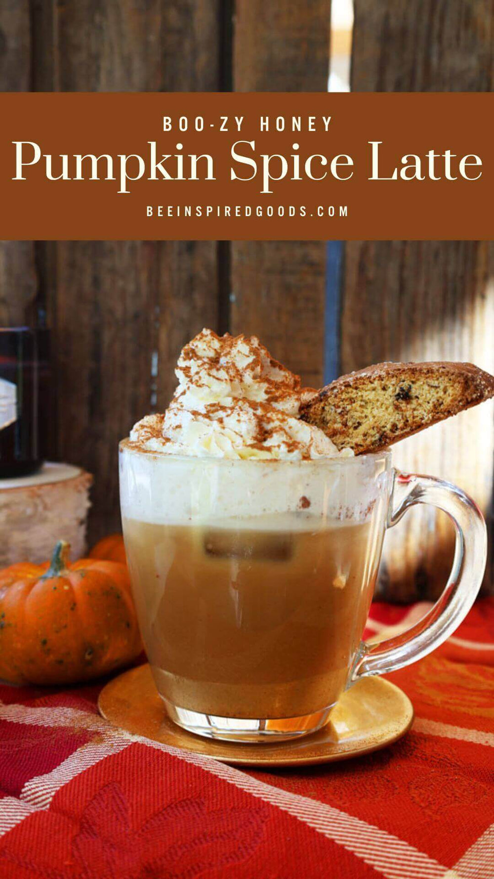 "Boo-zy Honey Pumpkin Spice Latte beeinspiredgoods.com" with a pumpkin spice latte garnished with biscotti