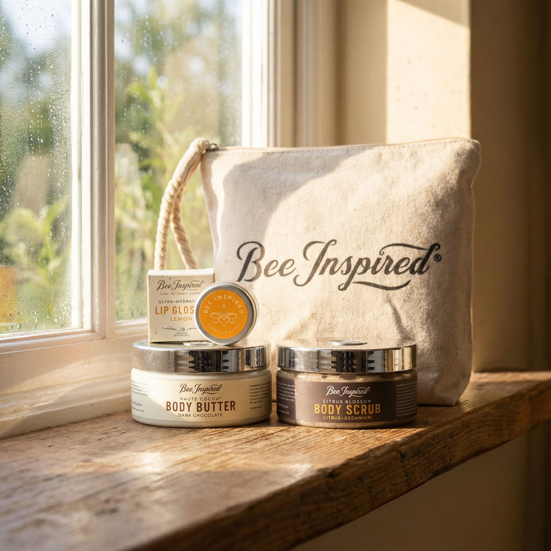 Bee Inspired skincare products on a wooden surface with a window in the background