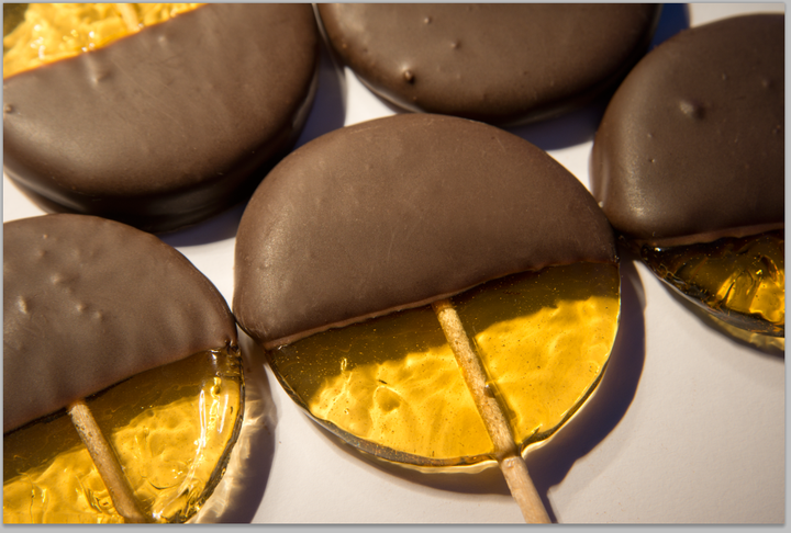 closeup of chocolate dipped lollipops