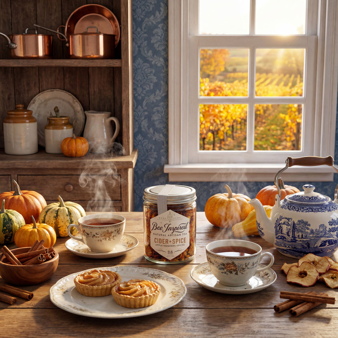 Autumn-themed table setting with tea, cookies, and pumpkin spice jar.