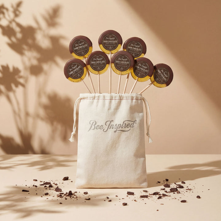 Bee-inspired product packaging with a drawstring bag on a beige background