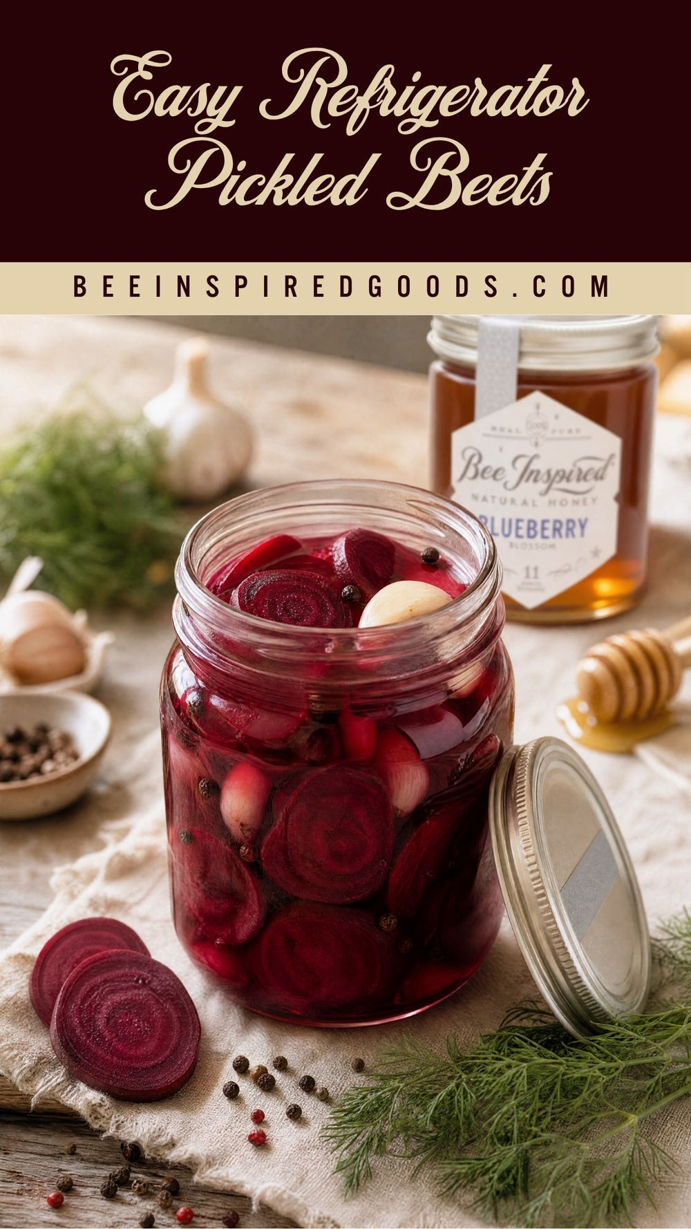 Jar of pickled beets on a wooden surface with herbs and spices, featuring Bee Inspired Goods branding.