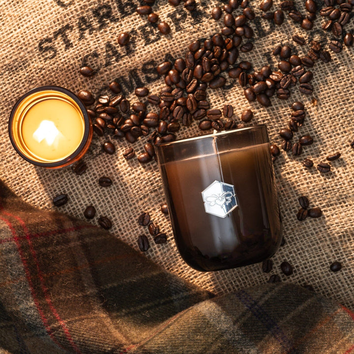double espresso luxe candle on coffee beans and bag