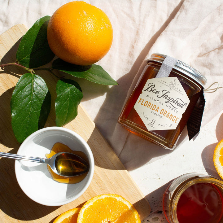 Florida Orange honey flat lay with oranges 