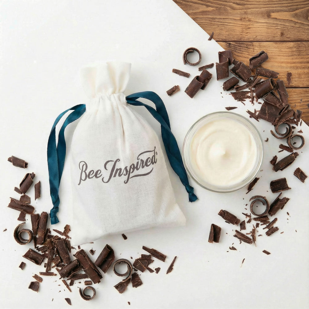 Bee Inspired product with chocolate pieces on a wooden surface