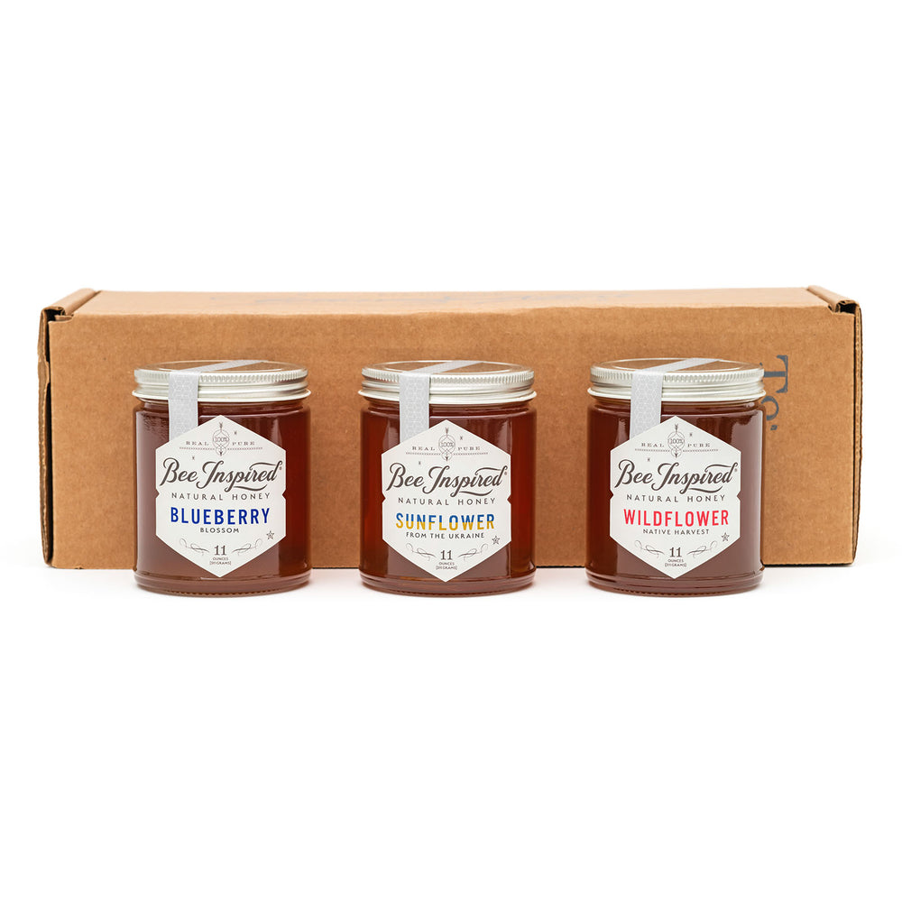 honey explorers set in front of a box