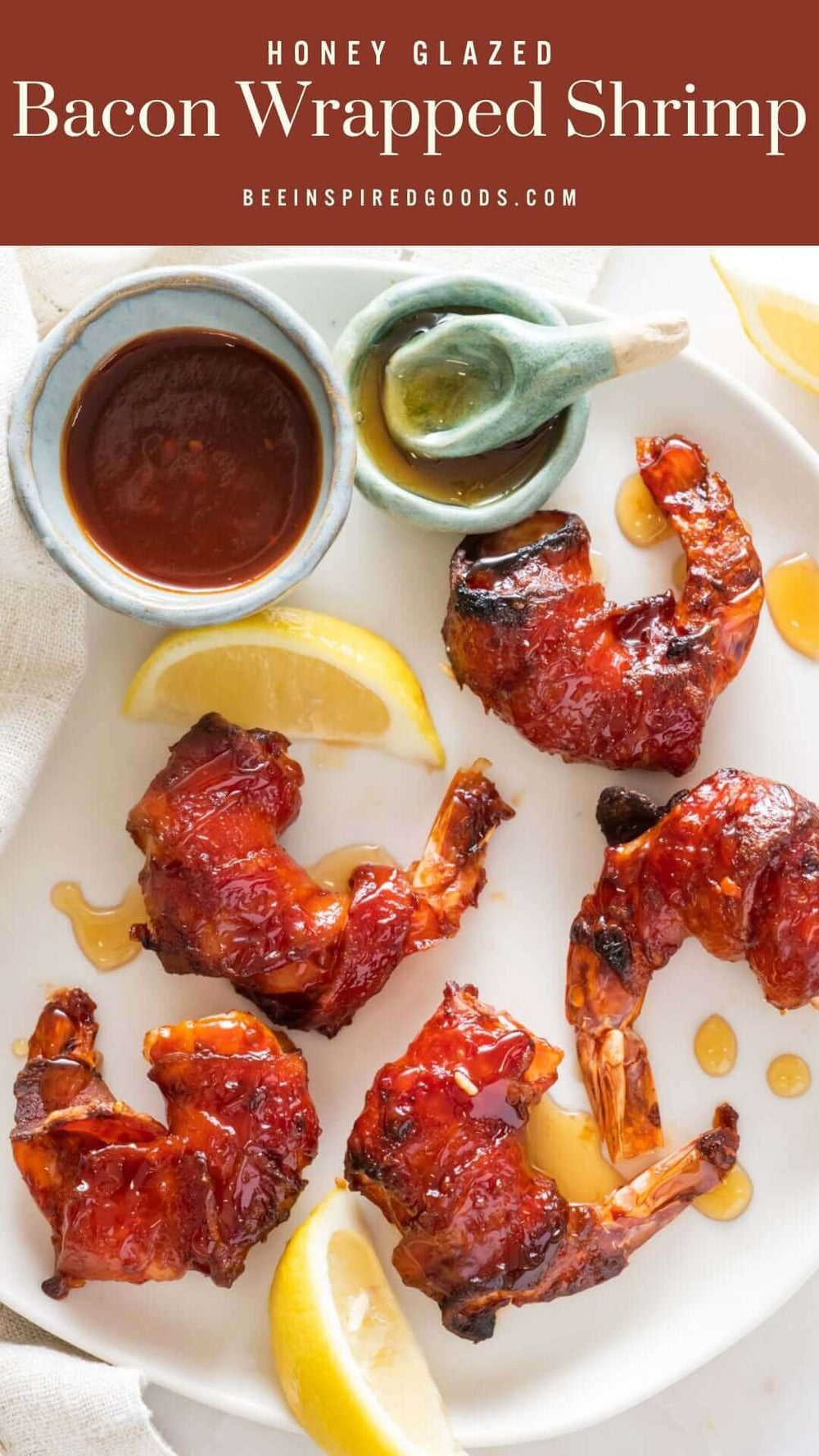 "Honey Glazed Bacon Wrapped Shrimp beeinspiredgoods.com" with a platter of bacon wrapped shrimp topped with honey and lemon juice