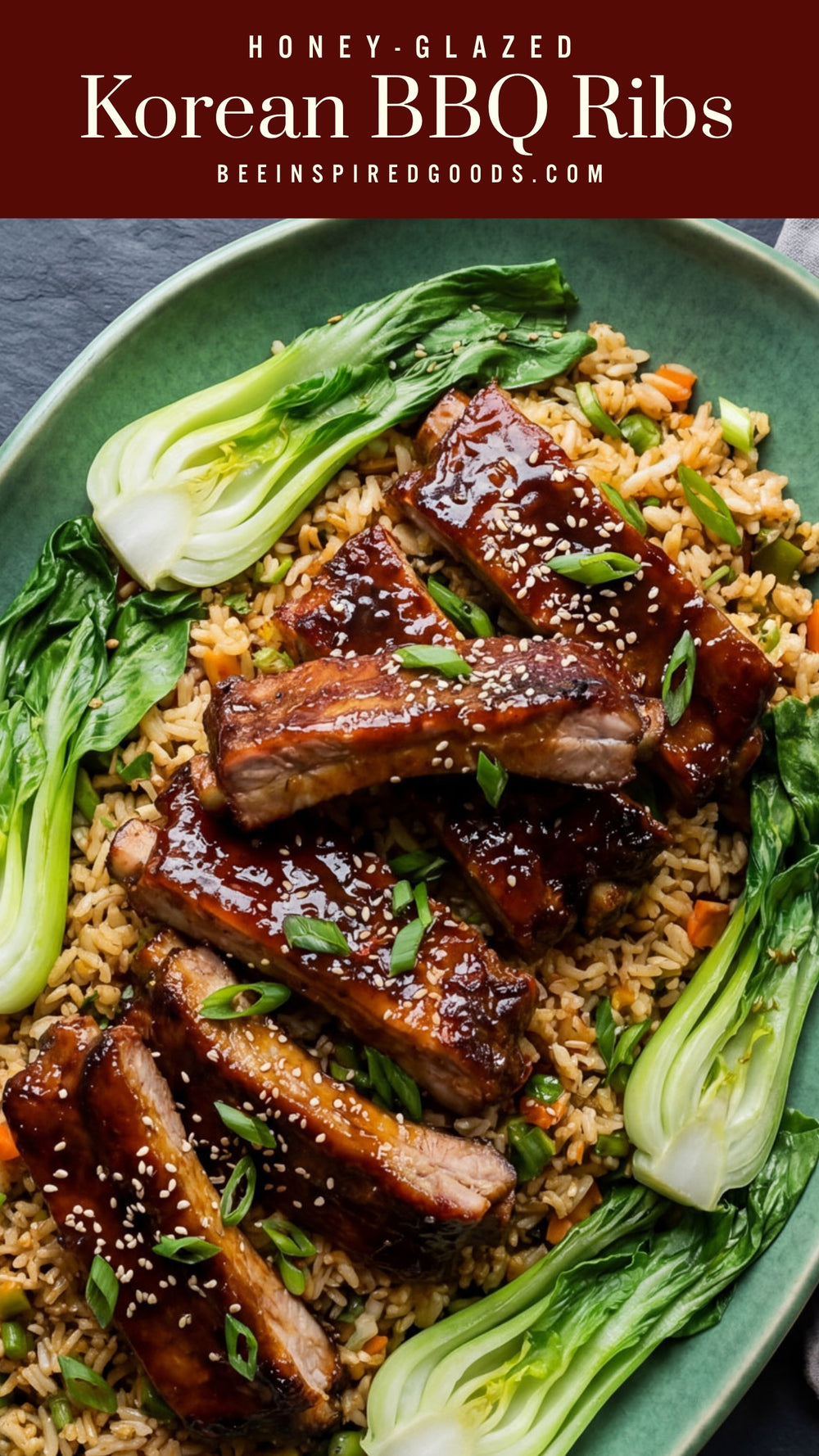 Honey-glazed Korean BBQ ribs on a bed of rice with bok choy, served on a green plate.