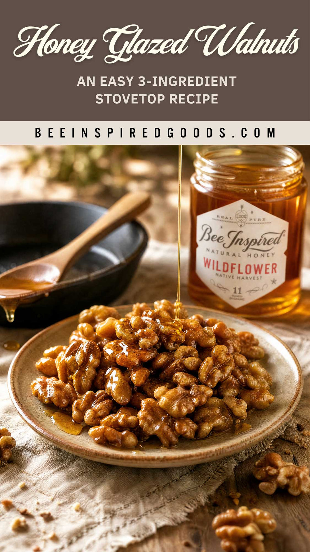 Honey glazed walnuts served on a ceramic plate with a jar of Bee Inspired Wildflower honey, set on a rustic table with a dark bowl and spoon in the background. Text overlays at the top read 'Honey Glazed Walnuts' and 'BEEINSPIREDGOODS.