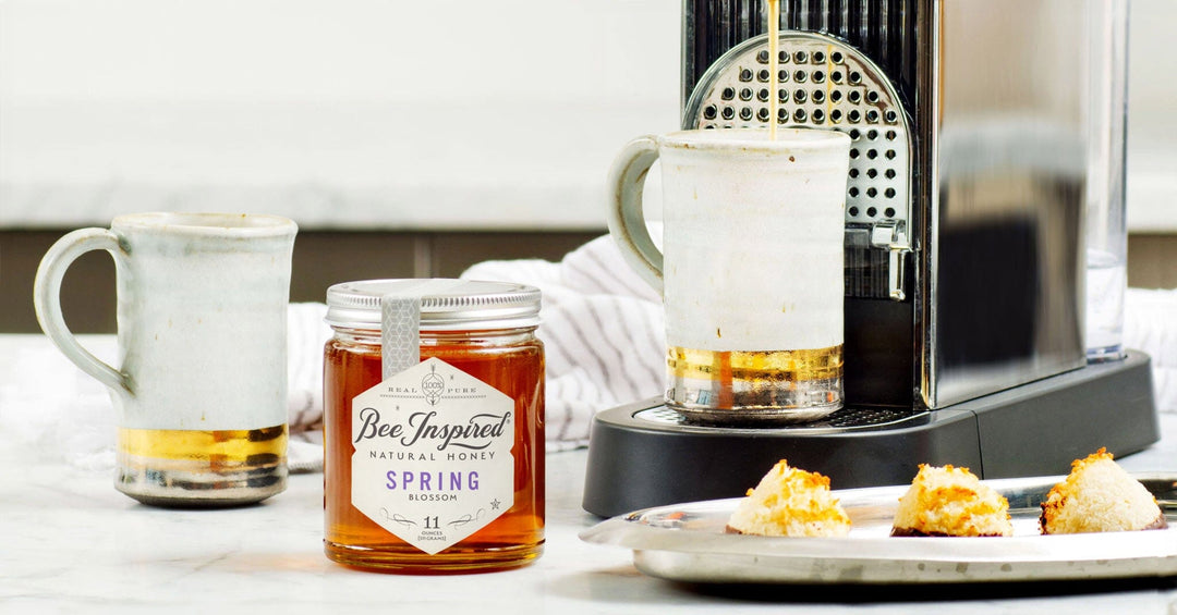 spring bee inspired honey with coffee mugs and macaroons