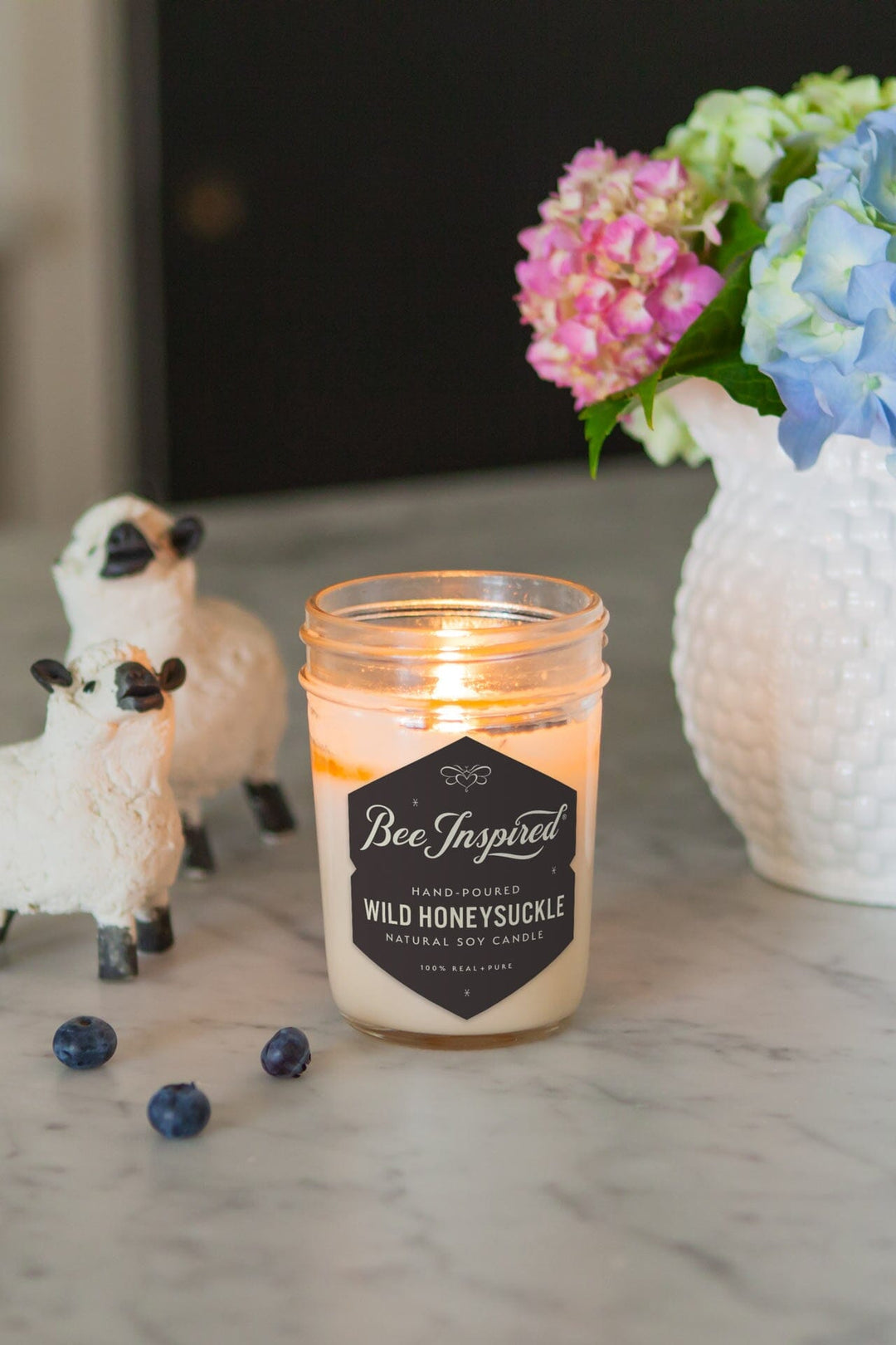 wild honeysuckle soy candle with sheep and flowers