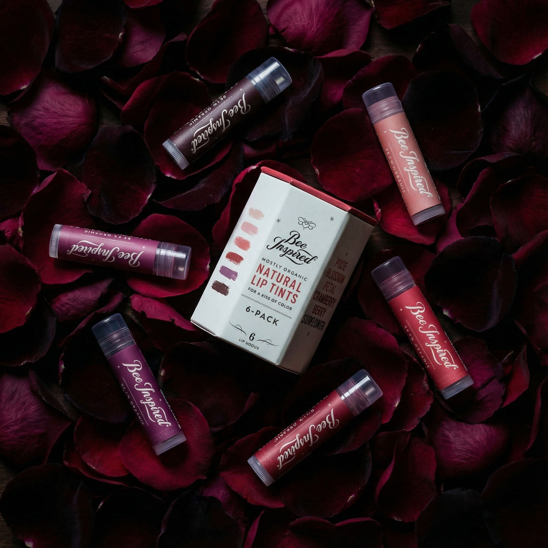 gift box and lip tint on bed of rose petals