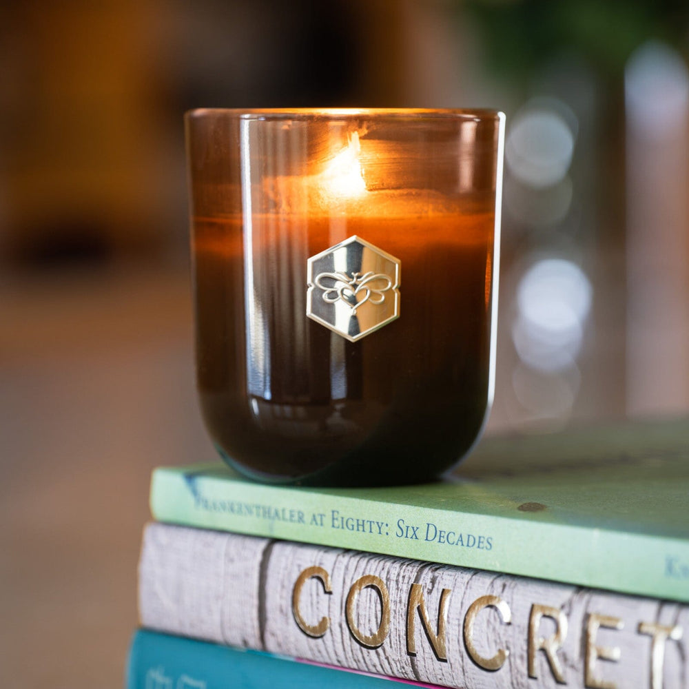 Autumn Harvest Luxe Candle on books