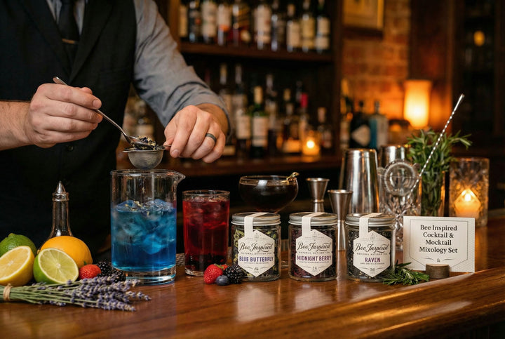 Bartender preparing cocktails with a row of cocktail ingredients and mixers on a bar.