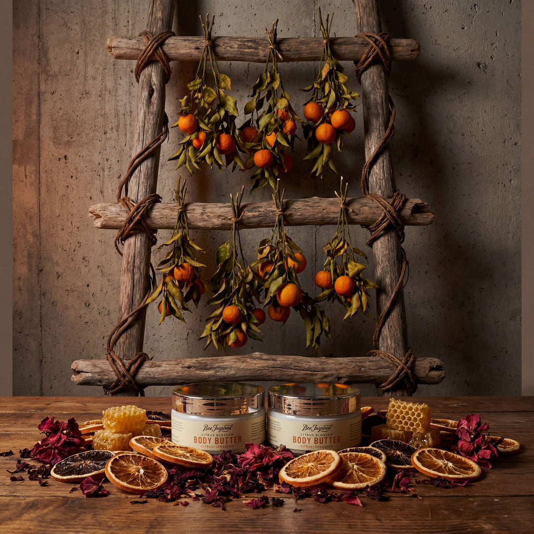 Body butters with dried fruits and flowers on a wooden surface and ladder background