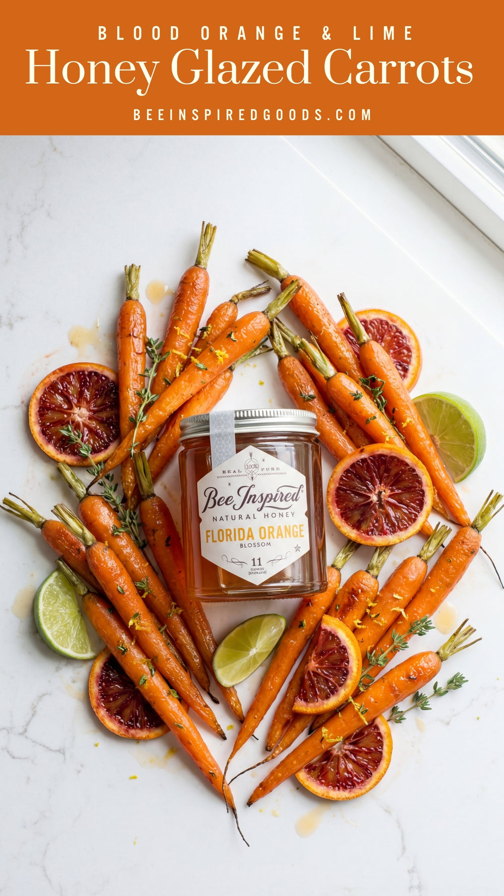 Honey glazed carrots with blood oranges and limes on a white surface, featuring a jar of Florida Orange honey.