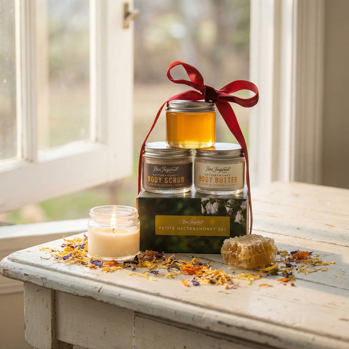 Set of body care products including candles and jars on a wooden surface with a window in the background.