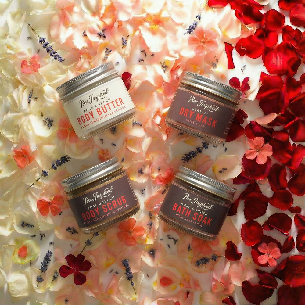 petite spring awkening set on bed of flower petals that represent the fragrance