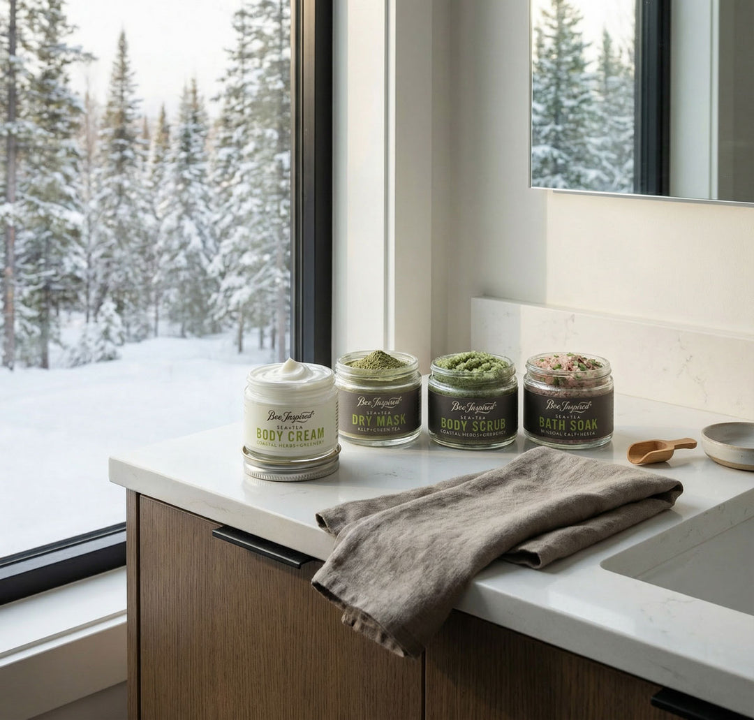 Cosmetic products on a counter with a snowy outdoor view