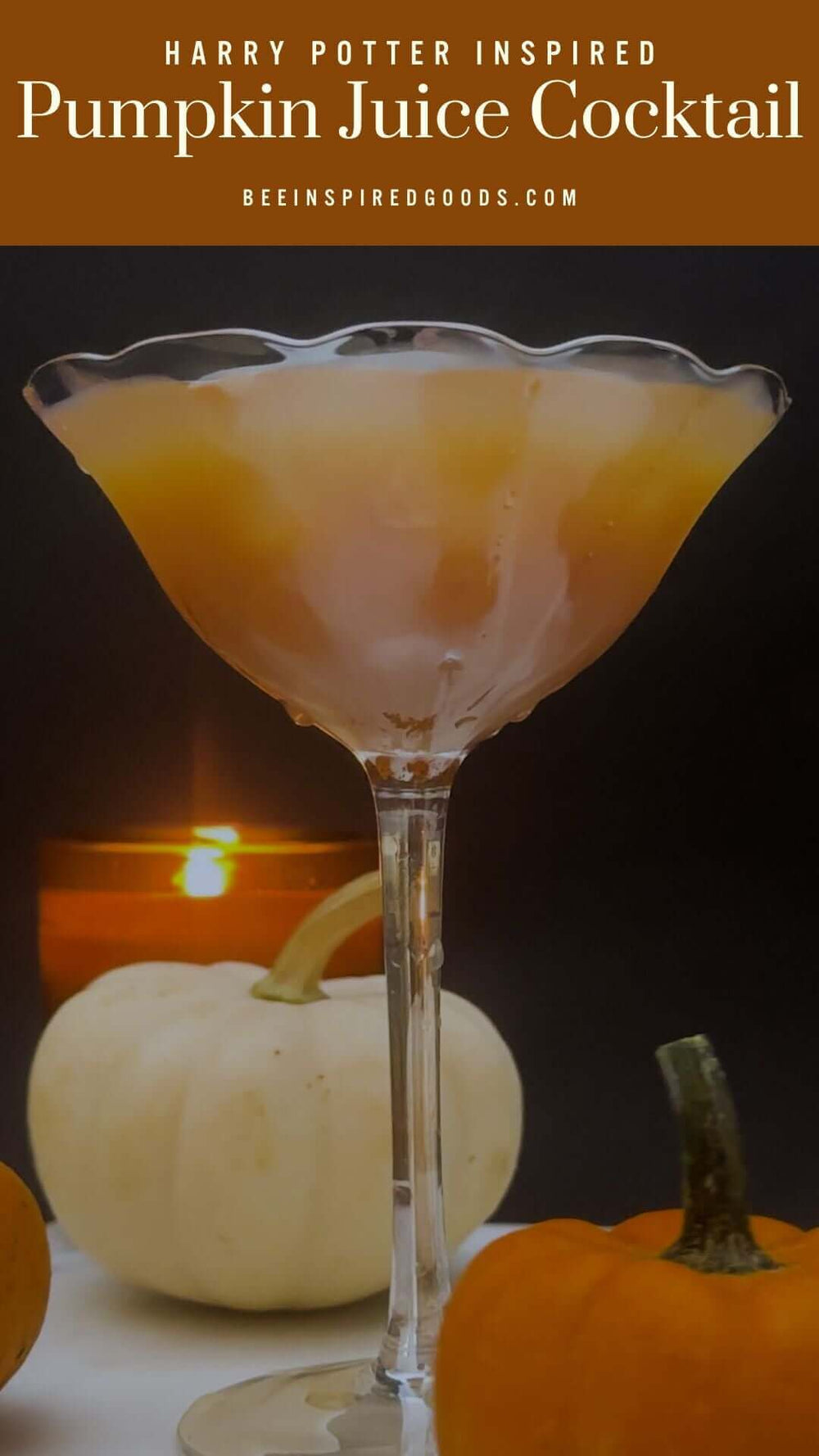 "Harry Potter Inspired Pumpkin Juice Cocktail beeinspiredgoods.com" with a cocktail glass next to pumpkins 