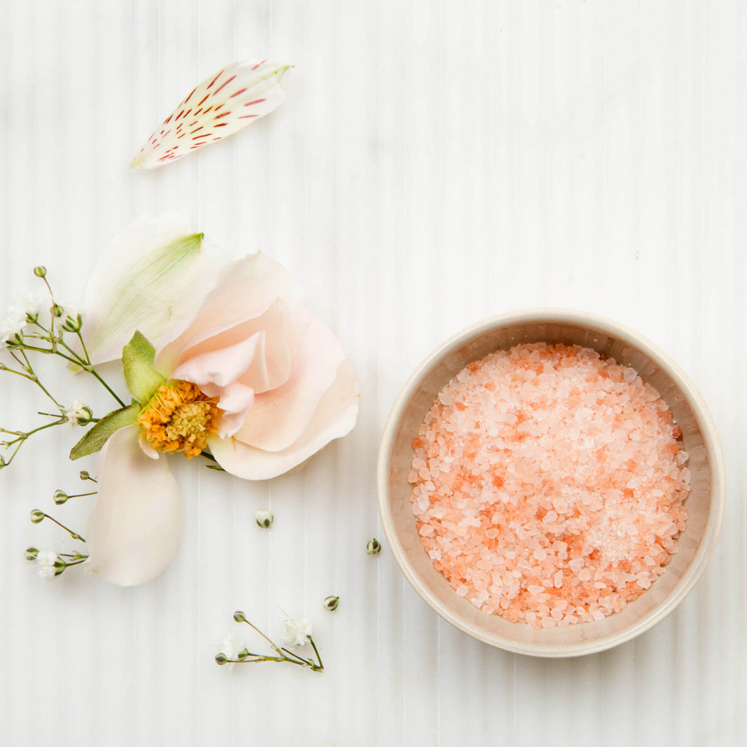 bee inspired rose garden bath soak in a bowl from above