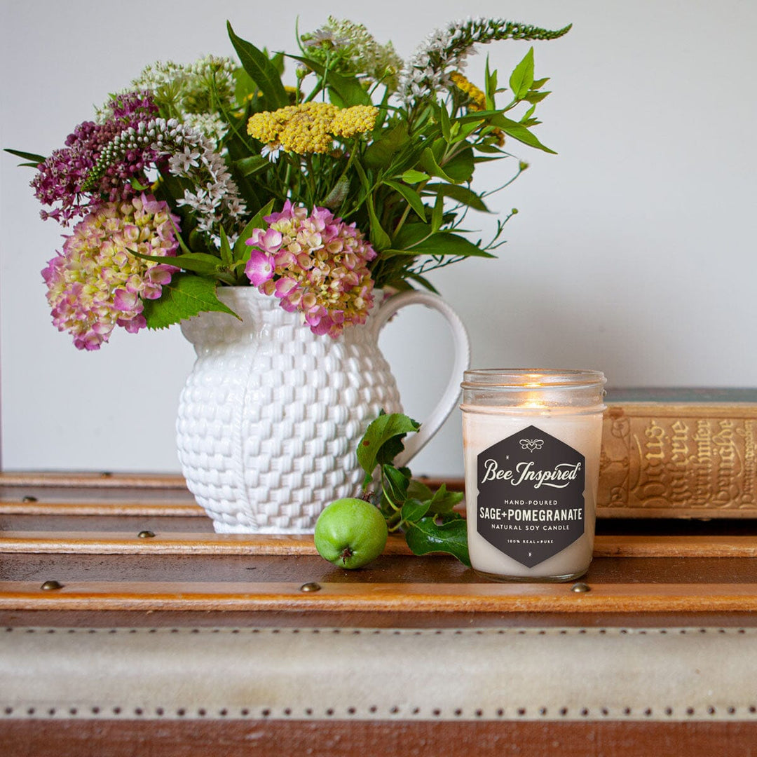 sage+pomegranate soy candle with flowres