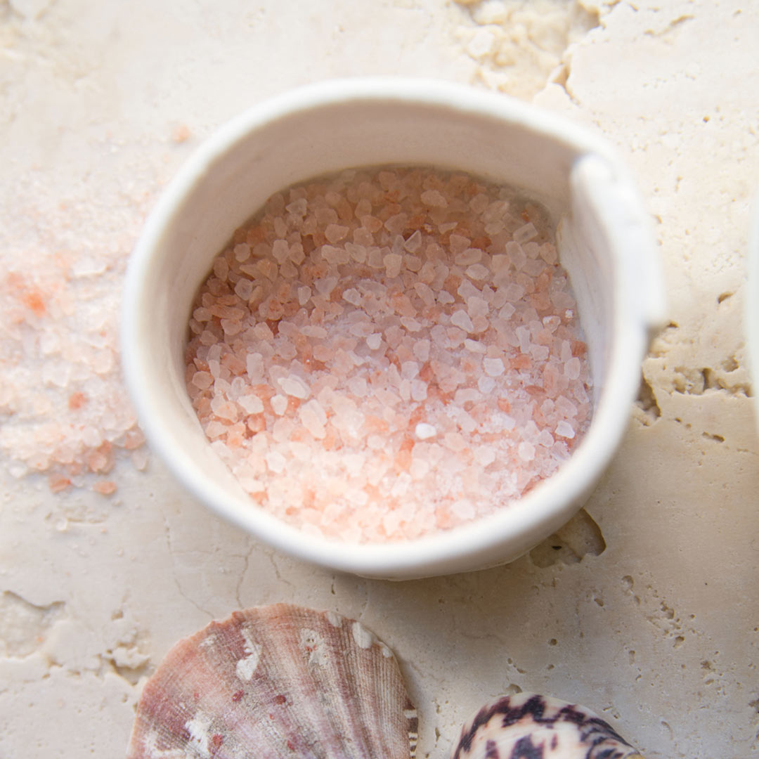 bee inspired sea + tea bath soak in a bowl from above