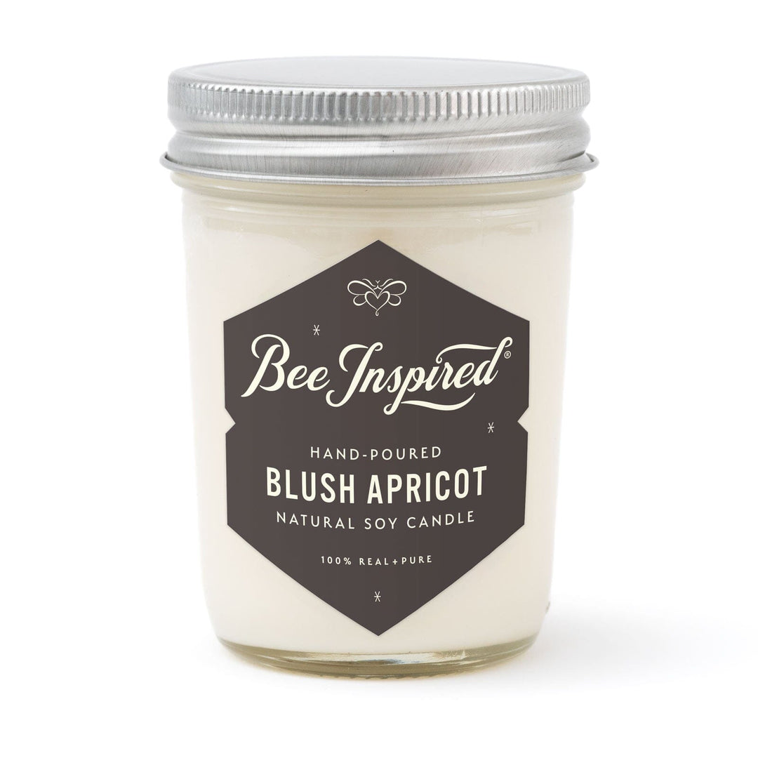 blush apricot jelly jar candle on white