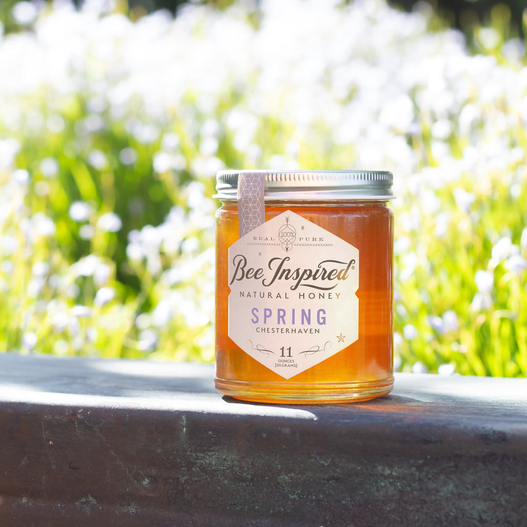 Spring honey in front of field 