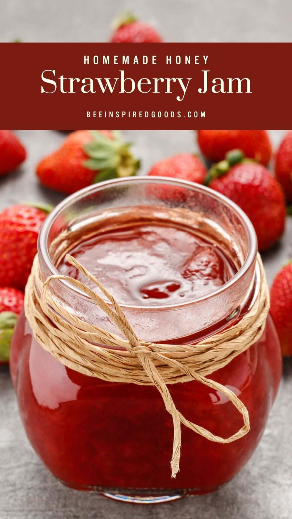 "Homemade Honey Strawberry Jam beeinspiredgoods.com" a jar of red jam with strawberries in the background