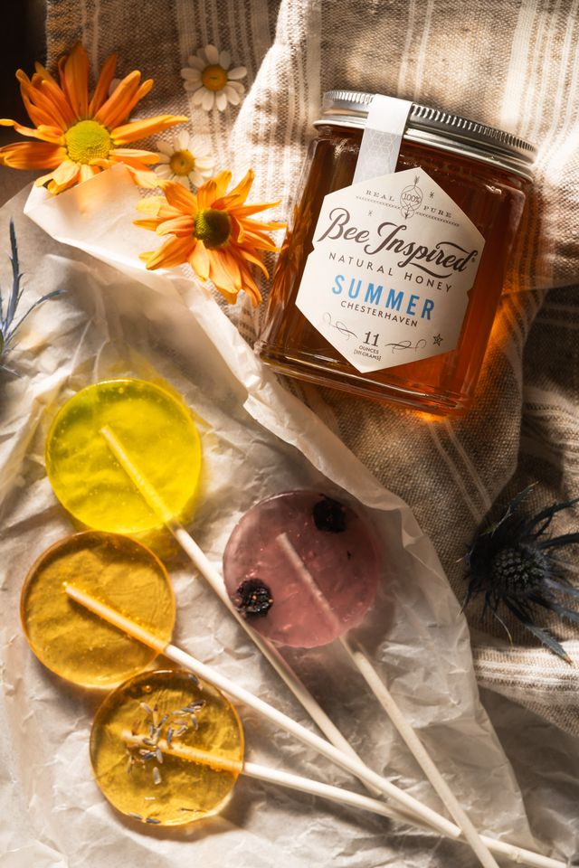 summer honey with our honey lollipops from bee inspired honey retail store in owings mills and flowers