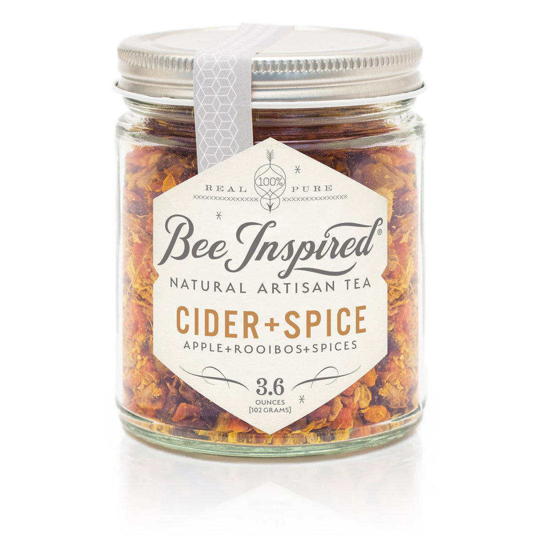 Jar of Bee Inspired Cider + Spice tea on a white background